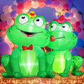 Two green frog inflatables, one in a bow tie and one blowing a kiss, in front of a balloon arch