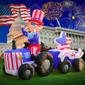 Uncle Sam inflatable driving a stars and stripes tractor with a Happy 4th trailer and fireworks behind