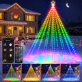 Rainbow LED flagpole Christmas tree with a star in a snowy yard with phone app, remote and effect samples